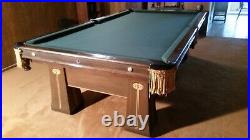 1916 Brunswick Regent four by nine Pooltable with Cue Rack, Lamps & Accessories