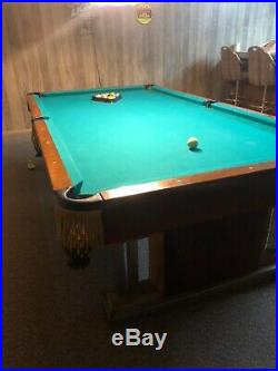 8ft brunswick pool table. Worth over $6000 comes with pool cues