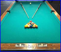 9-foot, professional size, tournament pool table with a 3-piece slate base