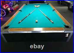 9-foot, professional size, tournament pool table with a 3-piece slate base