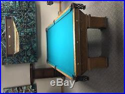 Antique Brunswick 8 foot Wellington pool table. Matching Littman LED light