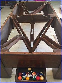 Antique Brunswick 9' Pool Table with ball return. Mint Condition One of A Kind