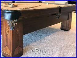 Antique brunswick pool table
