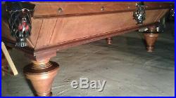 Antique pool table (9foot, schwikert&sons1890s with original accessories)
