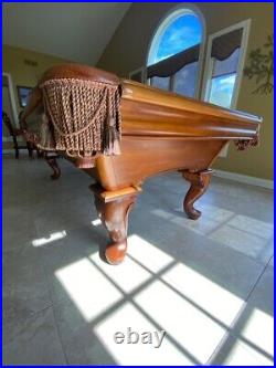 Brunswick 8' Camden II pool table. Billiard table in Chestnut color wood