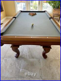 Brunswick 8' Camden II pool table. Billiard table in Chestnut color wood