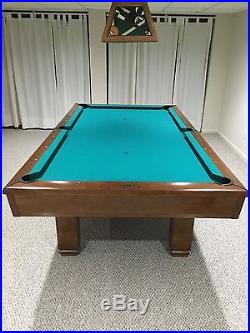 Brunswick 8' pool table, Centennial balls withmatching floor rack, accessory pack
