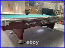 Brunswick 9 Foot Gold Crown V Tournament Edition pool table with matching light