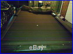 Brunswick Buckingham Pool table with 4 bar stools and pool stick wall mount