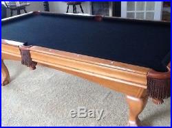 Brunswick Contender 8' Pool Table with black felt top. Excellent condition