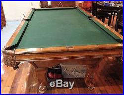 Brunswick Pool Table with Some Accessories Included