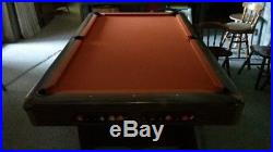 Caramel colored Brunswick pool table 8