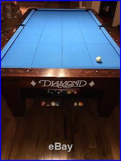Diamond 9' one piece slate pool table with diamond wood rails