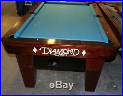 Diamond coin operated pool table in operating good condition 7 foot table