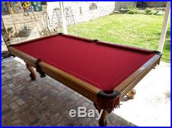 Olhausen 8' slate pool table, with cues and accessories and stained glass light
