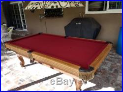 Olhausen 8' slate pool table, with cues and accessories and stained glass light