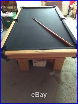 Olhusen southern oak 8' pool table with other games boards and all the sticks