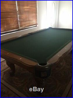 Pool Table! Includes cues, balls, Cue Wall Rack, clock. Billiards