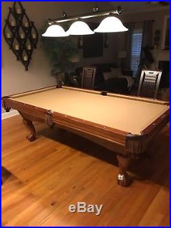Pool table (7 foot Brunswick Contender) with accessories. Slightly used