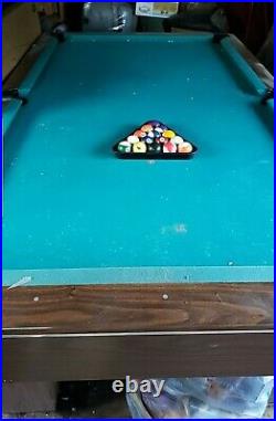 Pool table 8 foot by 4 in good condition, green felt with rack and balls